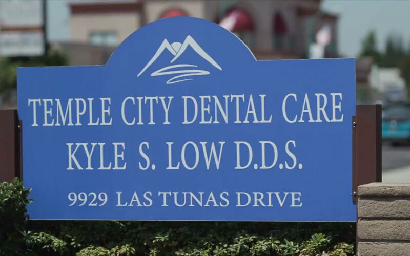 Temple City Dental Care sign outside of building.